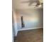 Bedroom featuring hardwood floors, fresh paint, a ceiling fan, and closet space at 4300 N Lamont St # 249, Las Vegas, NV 89115