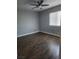 Cozy bedroom with wood floors, a ceiling fan, and window with natural light at 4300 N Lamont St # 249, Las Vegas, NV 89115
