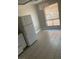 Dining area with tiled flooring, a window with blinds, and a modern chandelier at 4300 N Lamont St # 249, Las Vegas, NV 89115