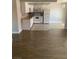 Open-concept kitchen featuring a white refrigerator, stove, microwave, and light countertops at 4300 N Lamont St # 249, Las Vegas, NV 89115