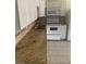 Bright kitchen with granite counters, stainless steel sink, and modern white appliances at 4300 N Lamont St # 249, Las Vegas, NV 89115