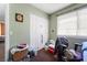 Bedroom showcasing window, closet, and green painted walls at 4323 E Twain Ave, Las Vegas, NV 89121