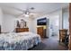Bedroom featuring carpet, a television and furniture at 4323 E Twain Ave, Las Vegas, NV 89121
