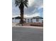 Charming single-story home with a spacious driveway and well-maintained front yard at 4461 Greenhill Dr, Las Vegas, NV 89121