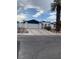 Charming single-story home featuring a spacious driveway and well-maintained landscaping at 4461 Greenhill Dr, Las Vegas, NV 89121