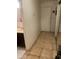 Well-lit hallway leading to bedrooms and bathrooms at 4461 Greenhill Dr, Las Vegas, NV 89121