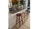 Kitchen featuring barstool seating and a granite countertop at 4461 Greenhill Dr, Las Vegas, NV 89121