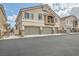 Charming two-story home with a three-car garage and neutral stucco exterior at 4521 Bell Cord Ave # 103, North Las Vegas, NV 89031