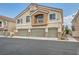 Charming two-story home with a three-car garage and neutral stucco exterior at 4521 Bell Cord Ave # 103, North Las Vegas, NV 89031