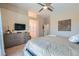 Spacious bedroom featuring neutral tones, a dresser, and ample storage space at 4521 Bell Cord Ave # 103, North Las Vegas, NV 89031