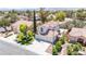 Aerial view of the house features a well-manicured yard and driveway at 4521 Crimson Leaf Dr, Las Vegas, NV 89130
