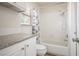 Neat bathroom features a shower-tub combo with tiled surround, granite countertop, and modern fixtures at 4521 Crimson Leaf Dr, Las Vegas, NV 89130