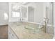 Bathroom with dual glass vessel sinks and granite countertops at 4521 Crimson Leaf Dr, Las Vegas, NV 89130