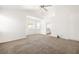 Large carpeted bedroom with vaulted ceilings, windows, and bright white walls at 4521 Crimson Leaf Dr, Las Vegas, NV 89130