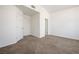 Bright bedroom features neutral carpeting and white walls, offering a blank canvas at 4521 Crimson Leaf Dr, Las Vegas, NV 89130