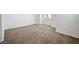 Comfortable carpeted bedroom featuring a window, ample space, and neutral-colored walls at 4521 Crimson Leaf Dr, Las Vegas, NV 89130