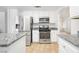 Well-equipped kitchen with stainless steel appliances, granite countertops, and ample cabinet space, ideal for culinary enthusiasts at 4521 Crimson Leaf Dr, Las Vegas, NV 89130