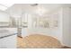 Inviting kitchen and breakfast nook with granite countertops, stainless steel appliances, and a bright, airy atmosphere at 4521 Crimson Leaf Dr, Las Vegas, NV 89130