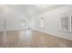 Spacious living area featuring tile floors and plenty of natural light at 4521 Crimson Leaf Dr, Las Vegas, NV 89130
