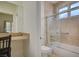 Bright bathroom with a shower-tub combo, granite vanity, and ample counter space provides comfort and style at 5112 Onion Creek Ln, Las Vegas, NV 89113