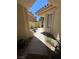 Inviting entryway with potted plants and a glimpse of the exterior at 5112 Onion Creek Ln, Las Vegas, NV 89113