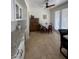 Well-lit kitchen featuring an eat-in area, white cabinets and granite countertops at 5112 Onion Creek Ln, Las Vegas, NV 89113