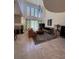 Elegant living room showcasing high ceilings and natural light at 5112 Onion Creek Ln, Las Vegas, NV 89113