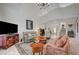 Spacious living room featuring a staircase and open-concept design at 5112 Onion Creek Ln, Las Vegas, NV 89113