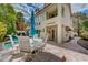 Outdoor patio features a pool with seating and lush landscaping, perfect for entertaining and relaxing at 5112 Onion Creek Ln, Las Vegas, NV 89113