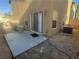 View of the backyard featuring a concrete patio and sliding glass door at 523 Cabis Bay St, Las Vegas, NV 89178
