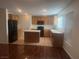 Well-equipped kitchen featuring essential appliances and a functional layout at 523 Cabis Bay St, Las Vegas, NV 89178