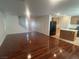 Open concept living space with new floors, seamlessly connecting the living area and kitchen at 523 Cabis Bay St, Las Vegas, NV 89178