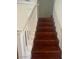 Staircase features wood treads and painted risers leading to the home's second level at 523 Cabis Bay St, Las Vegas, NV 89178