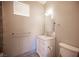 Bathroom with a white vanity with marble countertop and a toilet at 54 Blue Fountain Ct, Henderson, NV 89012
