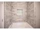 Bathroom featuring modern tile in shower and a bathtub at 54 Blue Fountain Ct, Henderson, NV 89012
