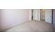 Bedroom with carpet floors, neutral color walls and a walk-in closet at 54 Blue Fountain Ct, Henderson, NV 89012