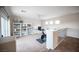 Bright bonus room features shelving, neutral walls, ceiling fan, and natural light from windows at 54 Blue Fountain Ct, Henderson, NV 89012
