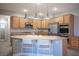 Well-equipped kitchen featuring a center island, stainless steel appliances, and ample storage at 54 Blue Fountain Ct, Henderson, NV 89012