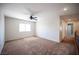 Bright loft area featuring neutral walls, carpet flooring, and access to multiple bedrooms at 54 Blue Fountain Ct, Henderson, NV 89012