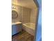 Bathroom featuring a round mirror, vanity and shower at 541 Indian Bluff St # 201, Las Vegas, NV 89145