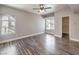 Open and bright bedroom with attractive wood-look flooring and ample natural light at 541 Indian Bluff St # 201, Las Vegas, NV 89145
