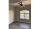 Bedroom features a ceiling fan, closet, and a window that provides natural light at 541 Indian Bluff St # 201, Las Vegas, NV 89145