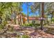 Charming building exterior with lush landscaping and a well-maintained walkway at 541 Indian Bluff St # 201, Las Vegas, NV 89145