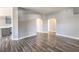 Bright and open living room with wood floors and multiple arched entryways at 541 Indian Bluff St # 201, Las Vegas, NV 89145