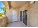 Covered patio with sliding glass door access to the interior at 541 Indian Bluff St # 201, Las Vegas, NV 89145