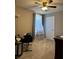 Neutral bedroom featuring carpet, a ceiling fan, curtains and a musical keyboard at 5550 Jinan St, Las Vegas, NV 89148
