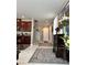 Entryway with staircase and view into an open kitchen area at 5550 Jinan St, Las Vegas, NV 89148