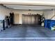 Spacious garage with ample storage cabinets and plenty of open floor space at 5550 Jinan St, Las Vegas, NV 89148