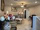 Upstairs loft area features a ceiling fan, comfortable seating, and natural light at 5550 Jinan St, Las Vegas, NV 89148