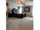 Spacious main bedroom featuring a ceiling fan and a dark wood finish bed set at 5550 Jinan St, Las Vegas, NV 89148